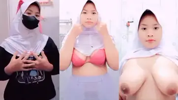 Bokep Indo Putriana Terbaru di WC pake Jilbab poster